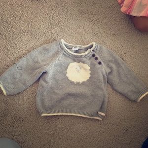 Sweater with a lamb on front